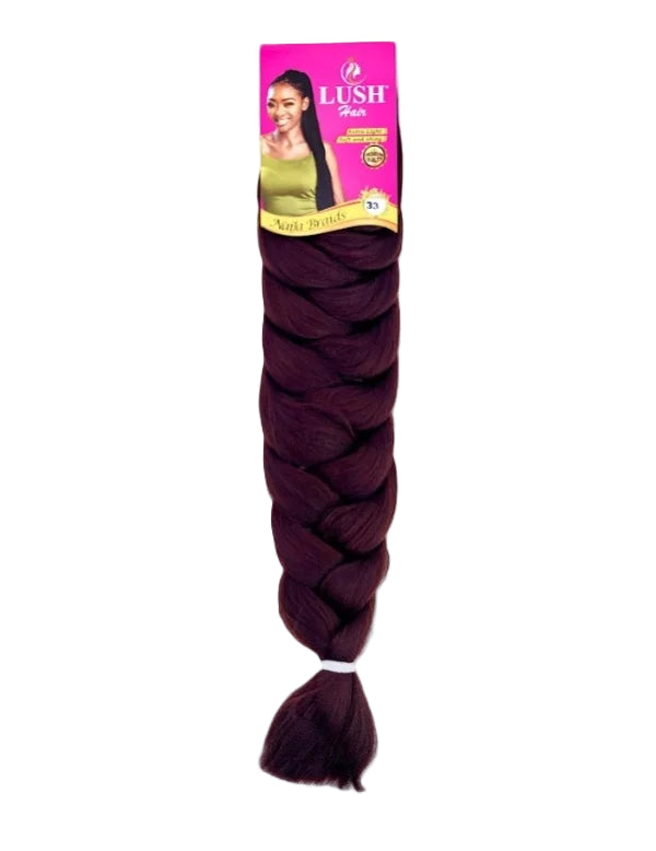 Braided hair extension with Lush Hair packaging on a white background