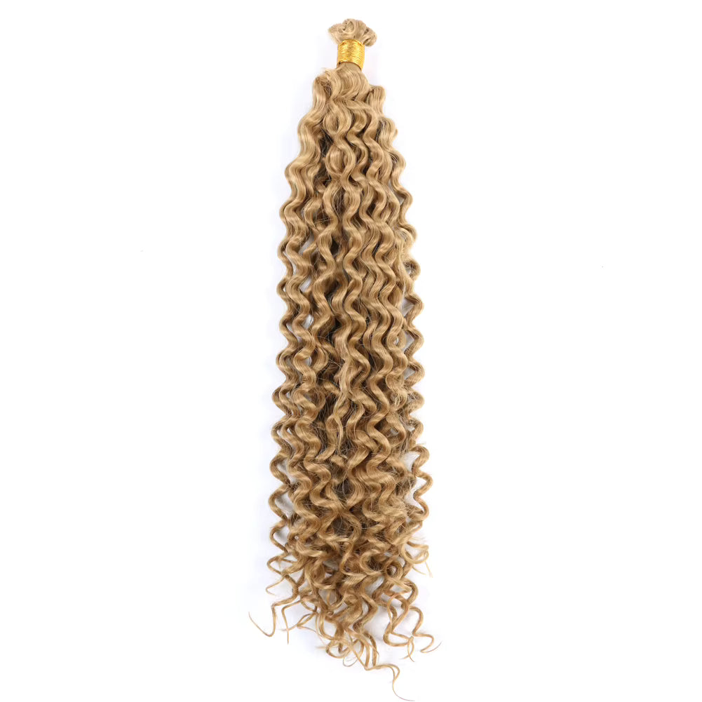 Braided hair extension with a gold clip on a white background