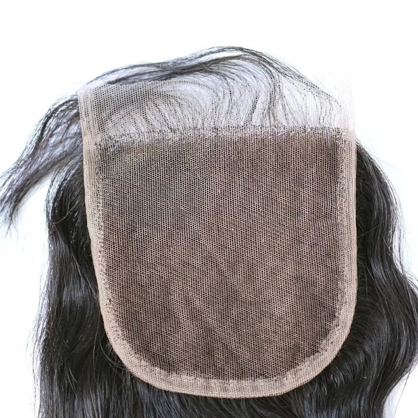 Hairpiece with a mesh back on a white background