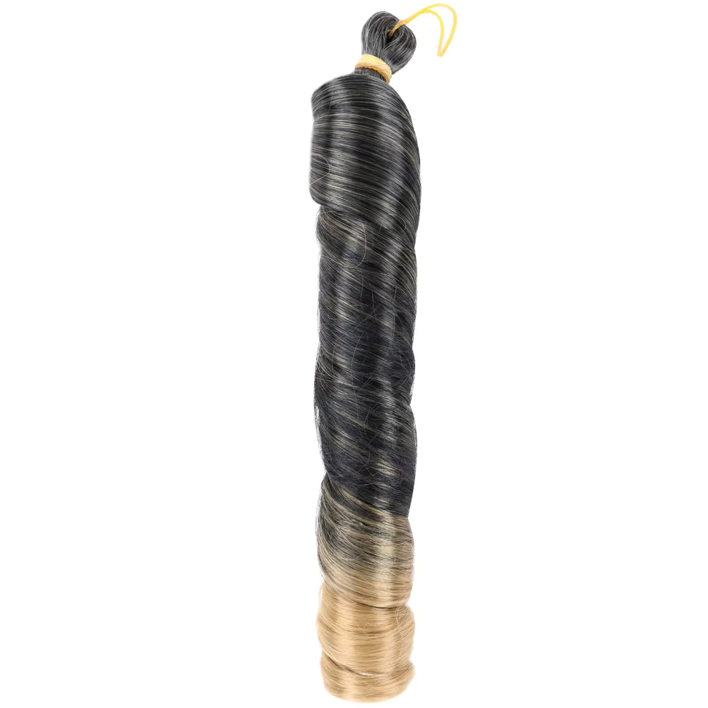Hair extension with black to blonde gradient on a white background
